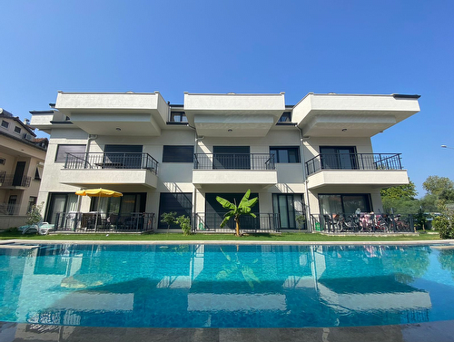 Apartment for Sale in a Gated Complex with Pool in Fethiye, Calıs